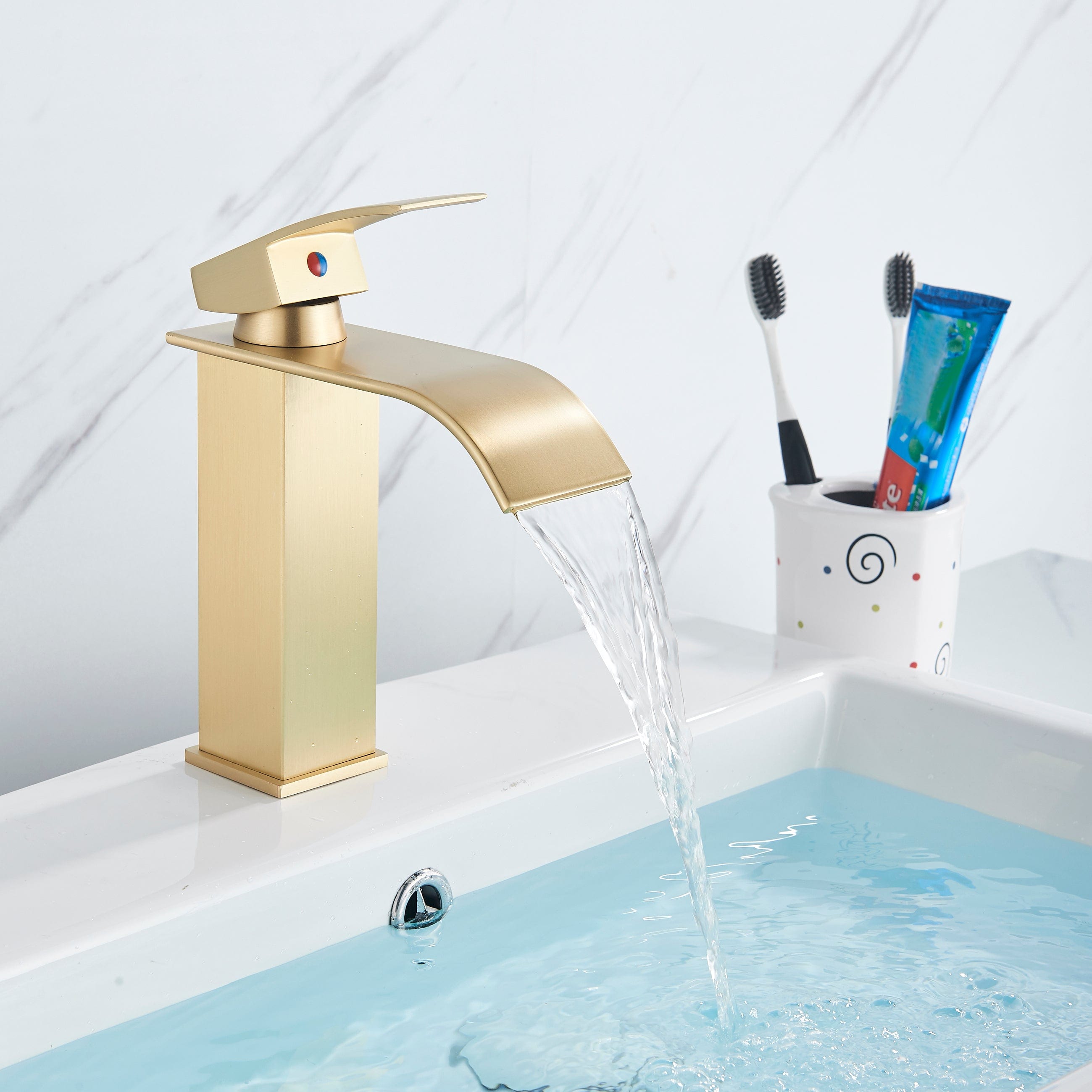 Bateria pentru lavoar Eigens, curgere tip cascada, auriu nichelat, cod 1377