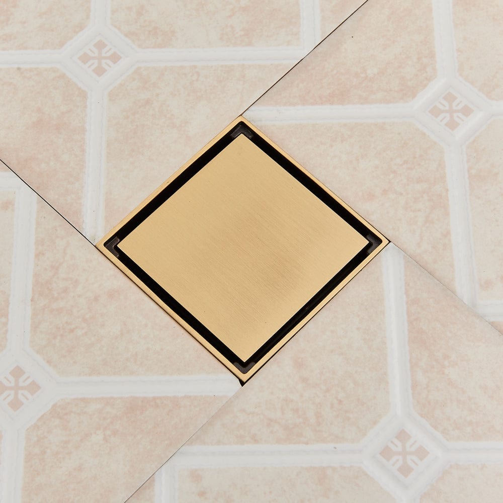 Sifon de pardoseala antimiros, cu iesire verticala, diametru ramă 100 mm, diametru scurgere 38 mm, doua fețe suport fixare placa gresie, auriu nichelat, cod 1521