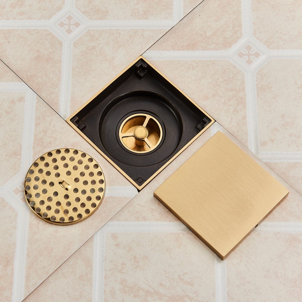 Sifon de pardoseala antimiros, cu iesire verticala, diametru ramă 100 mm, diametru scurgere 38 mm, doua fețe suport fixare placa gresie, auriu nichelat, cod 1521