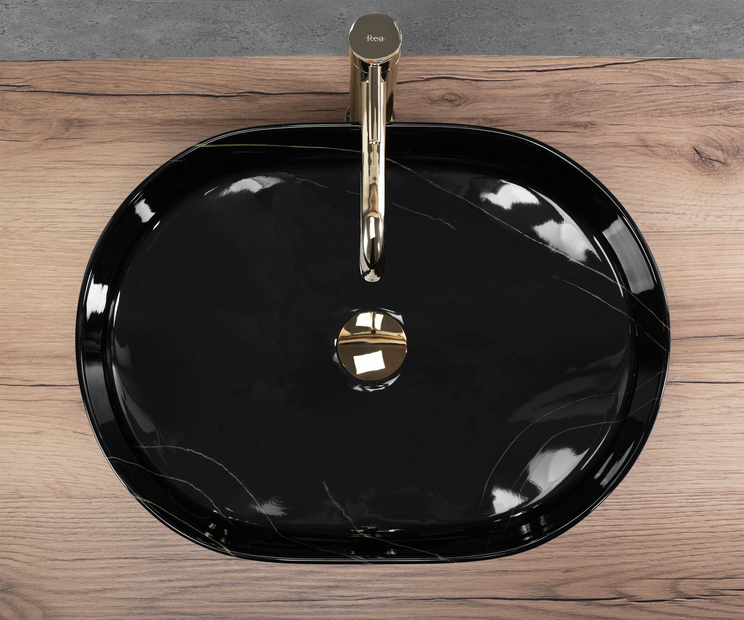 Lavoar baie pe blat oval 50 cm ceramic imitație piatră negru lucios – Rea Nadia 50 Black Stone
