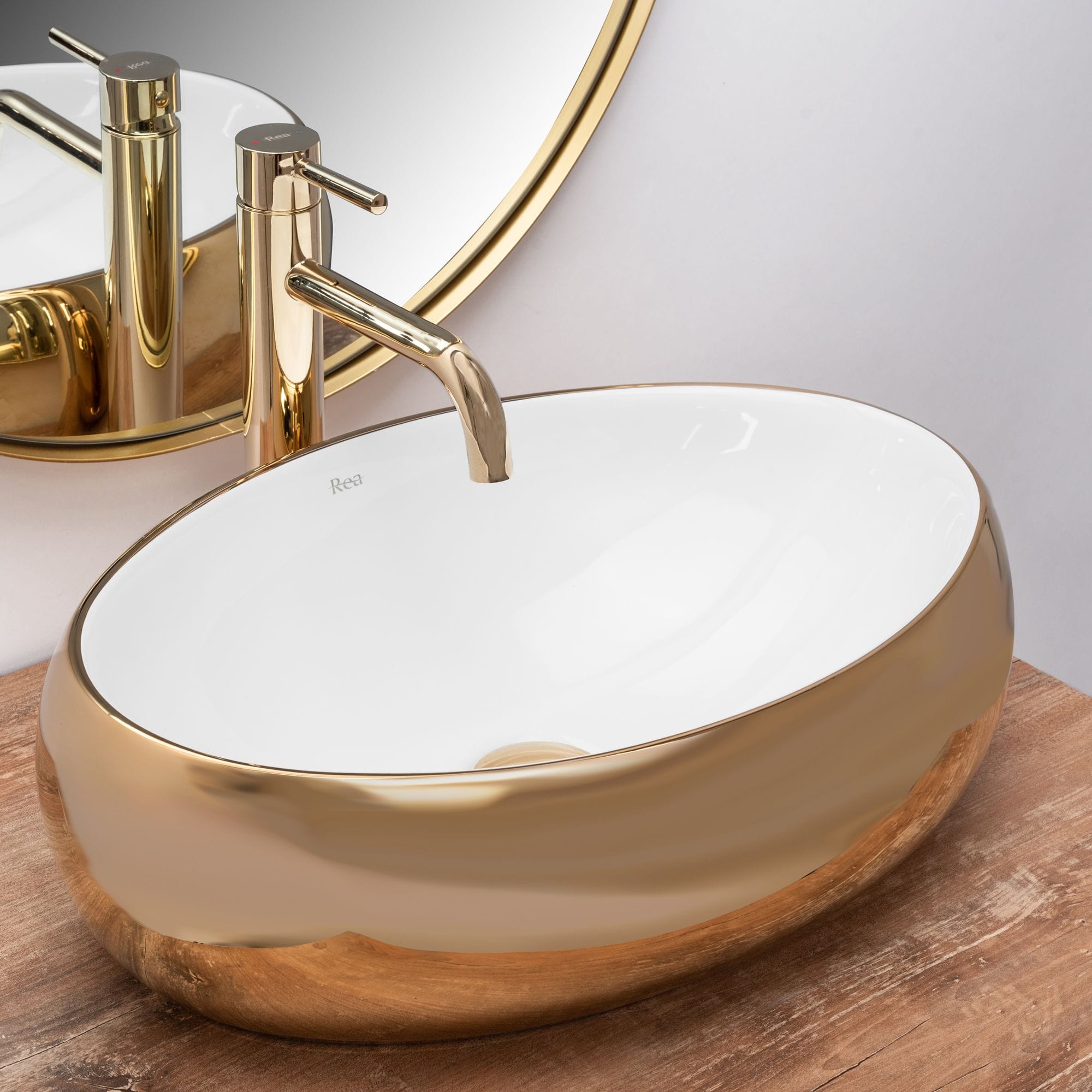 Lavoar ceramic pe blat Rea Linda, 48.5 cm, auriu lucios