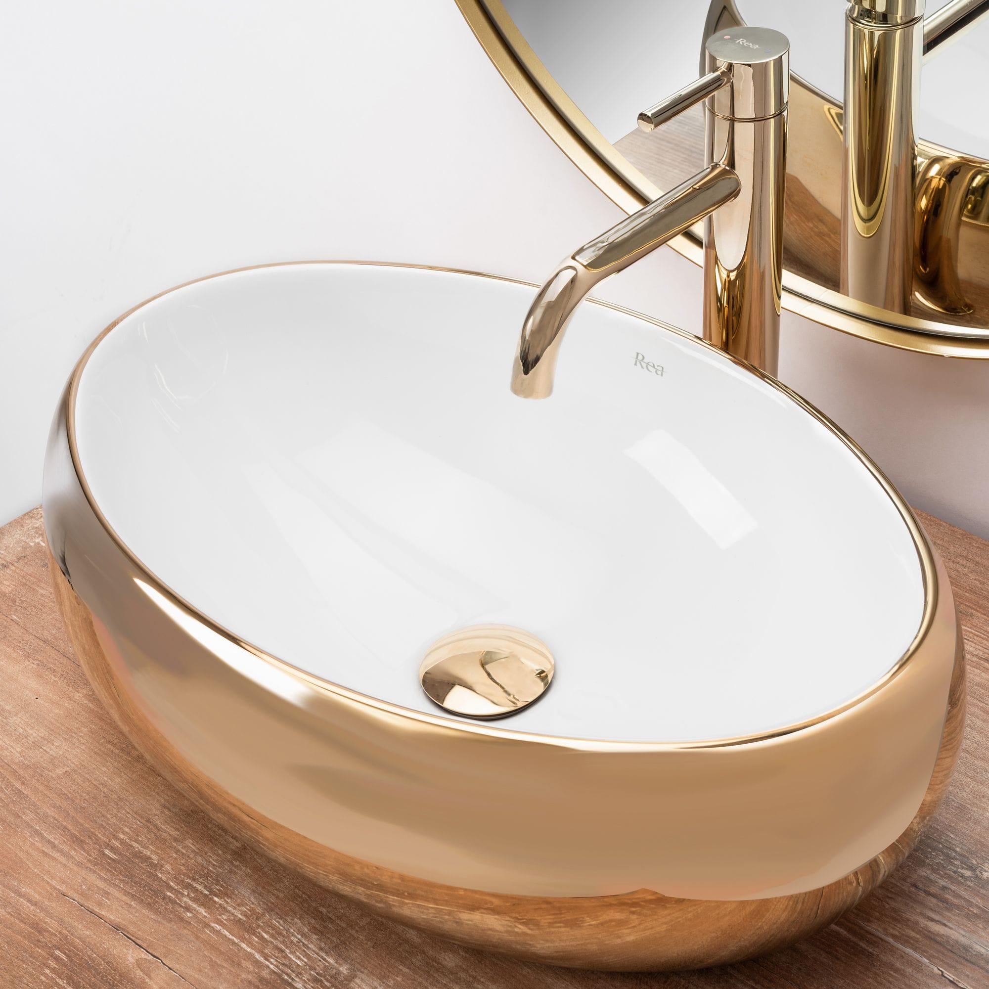 Lavoar ceramic pe blat Rea Linda, 48.5 cm, auriu lucios