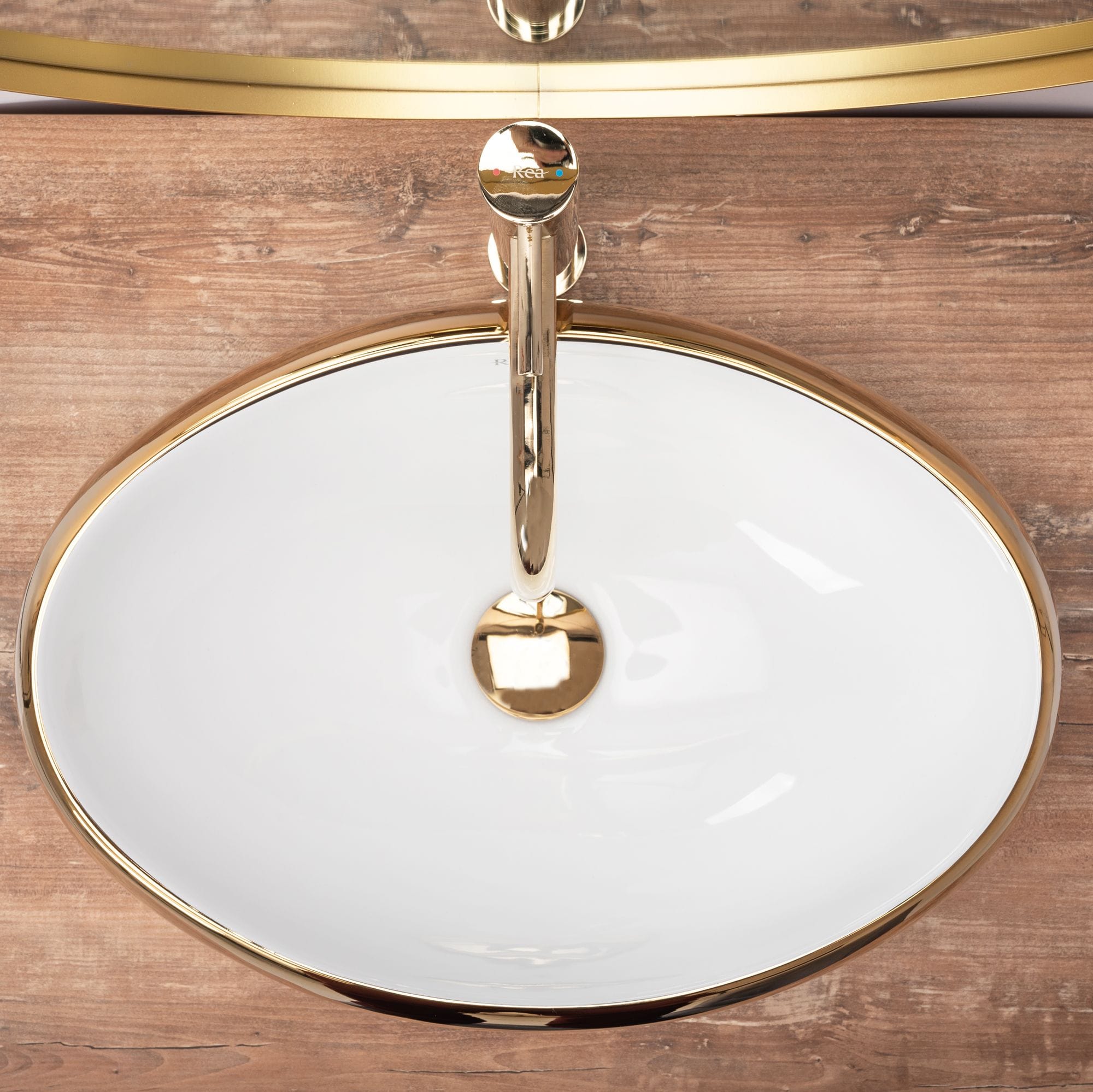 Lavoar ceramic pe blat Rea Linda, 48.5 cm, auriu lucios