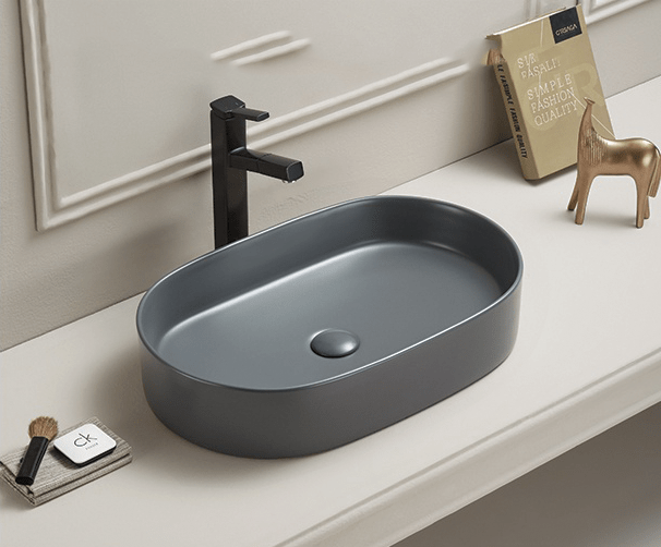 Lavoar oval pe blat gri mat cu ventil inclus 52x30 cm